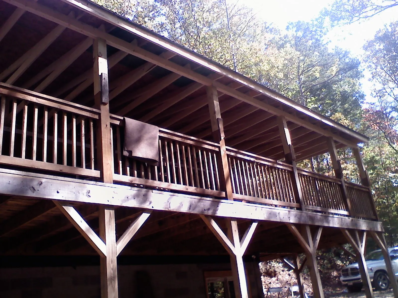 Timber framing under a new elevated porch and deck — Roof Leak Repair in Gardendale by Roofing Brothers